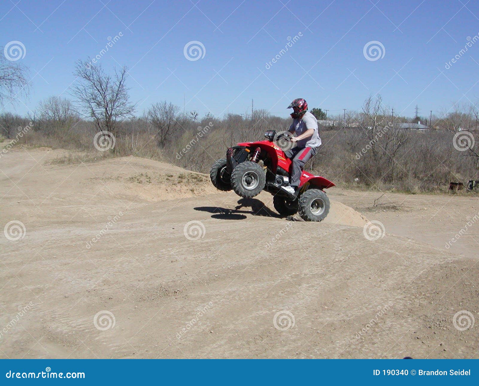 ATV Jump Shot stock photo. Image of extreme, summer, jump 190340