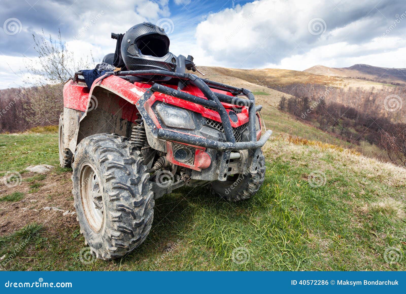 ATV on mountains landscape stock photo. Image of transportation 40572286
