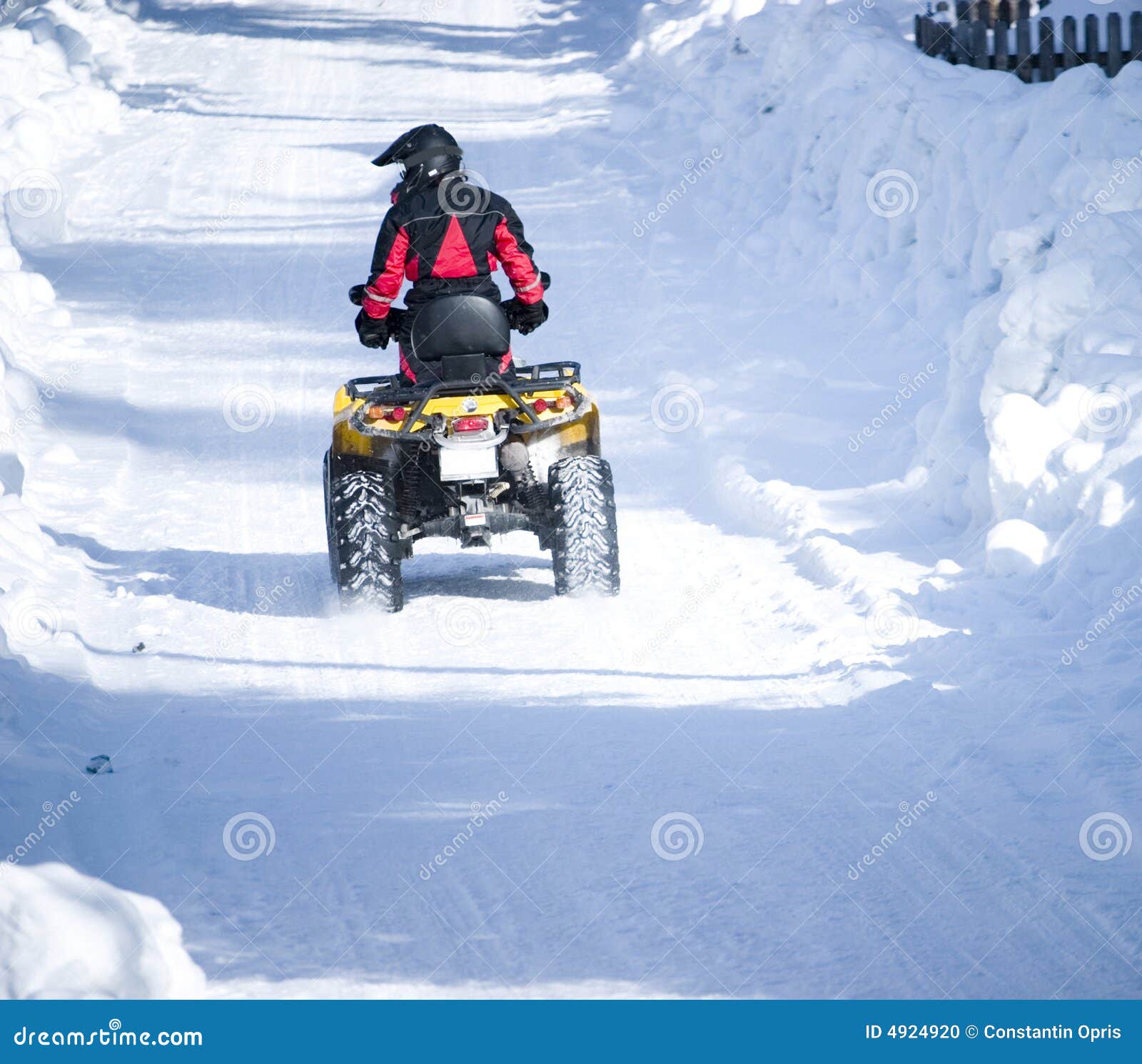 ATV in snow stock photo. Image of roadway, person, frozen 4924920