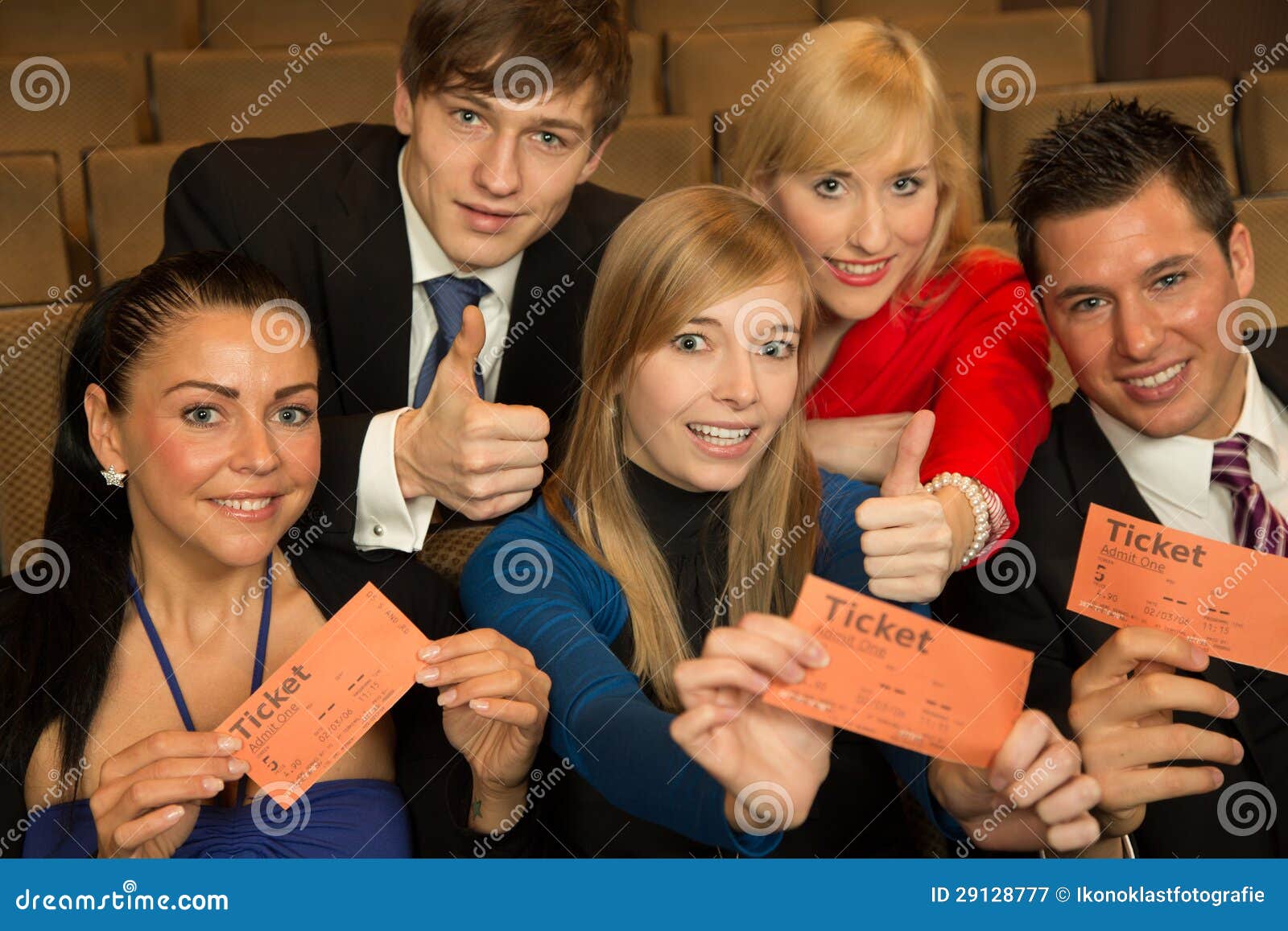 Audience Members Presenting Tickets Stock Image Image of robe