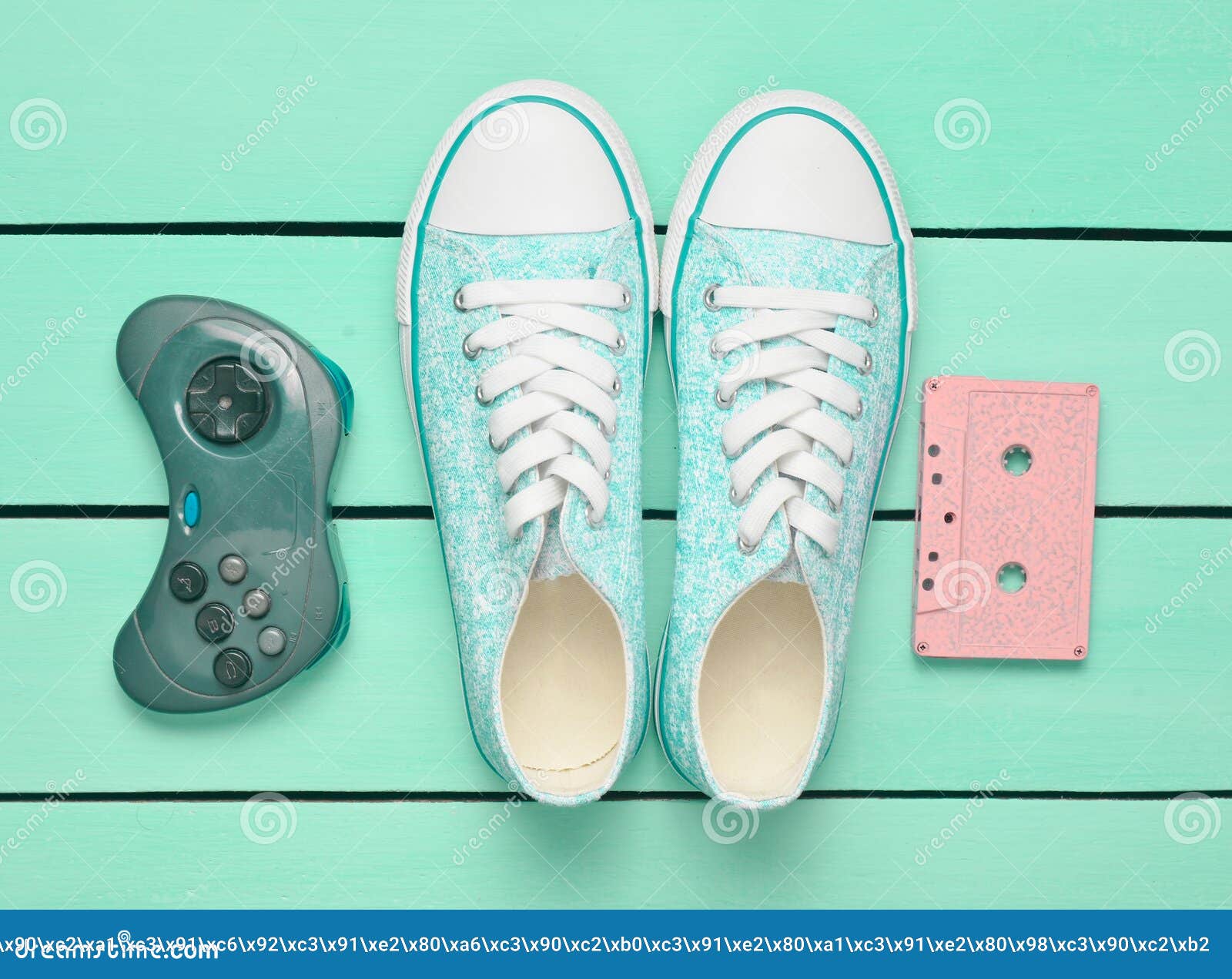 Audio Cassette, Gamepad, Sneakers Shoes on a Turquoise Pastel ...