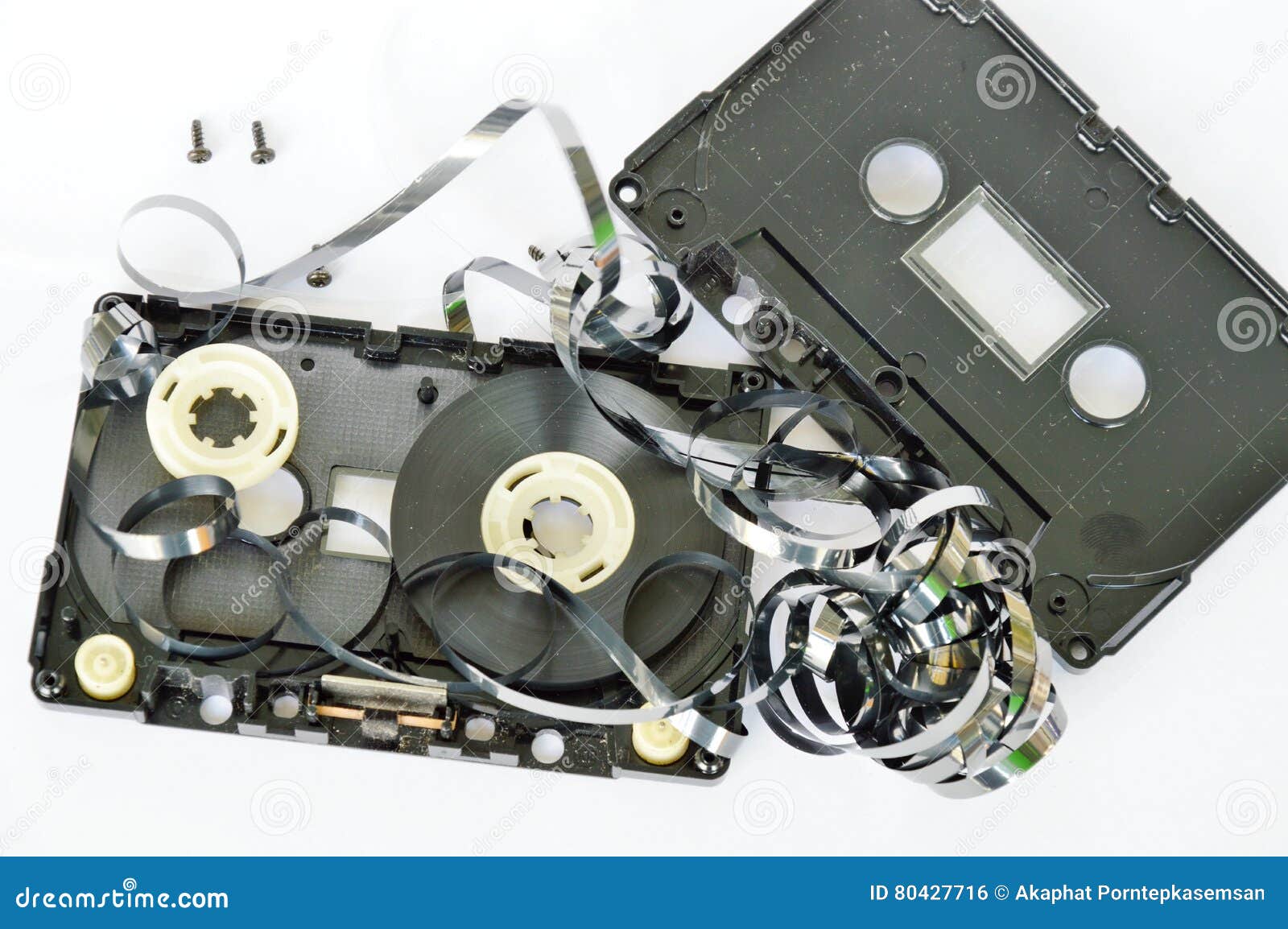 Audio Cassette Tape Separate Parts on White Background Stock Photo