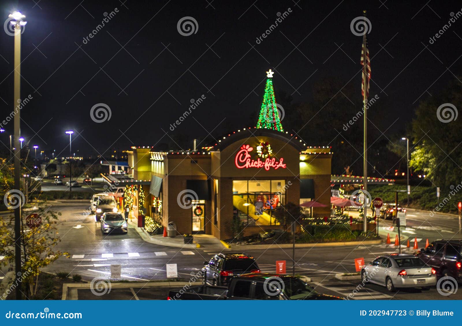 Chick Fil a at Night with Christmas Decorations Editorial Stock Photo