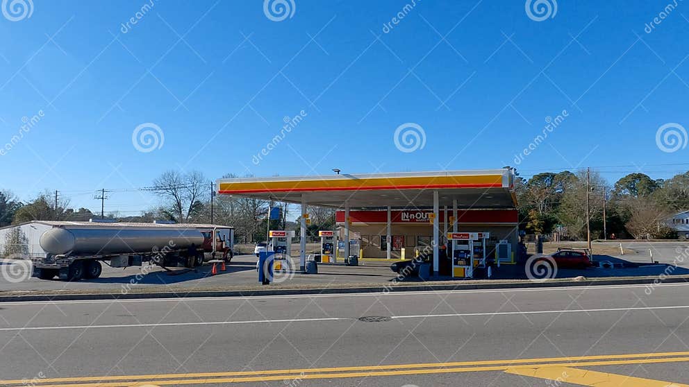 Christmas Day Gas Station Open People and Cars at Pumps Barton Chapel Road Editorial Stock Photo