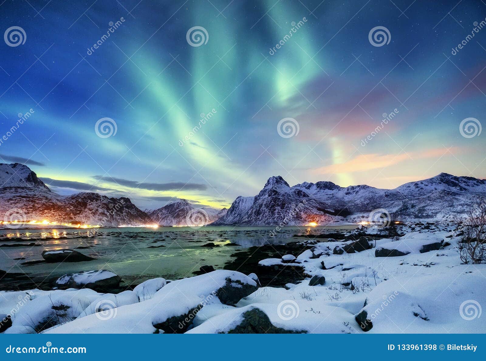 aurora borealis on the lofoten islands, norway. green northern lights above mountains. night sky with polar lights. night winter l