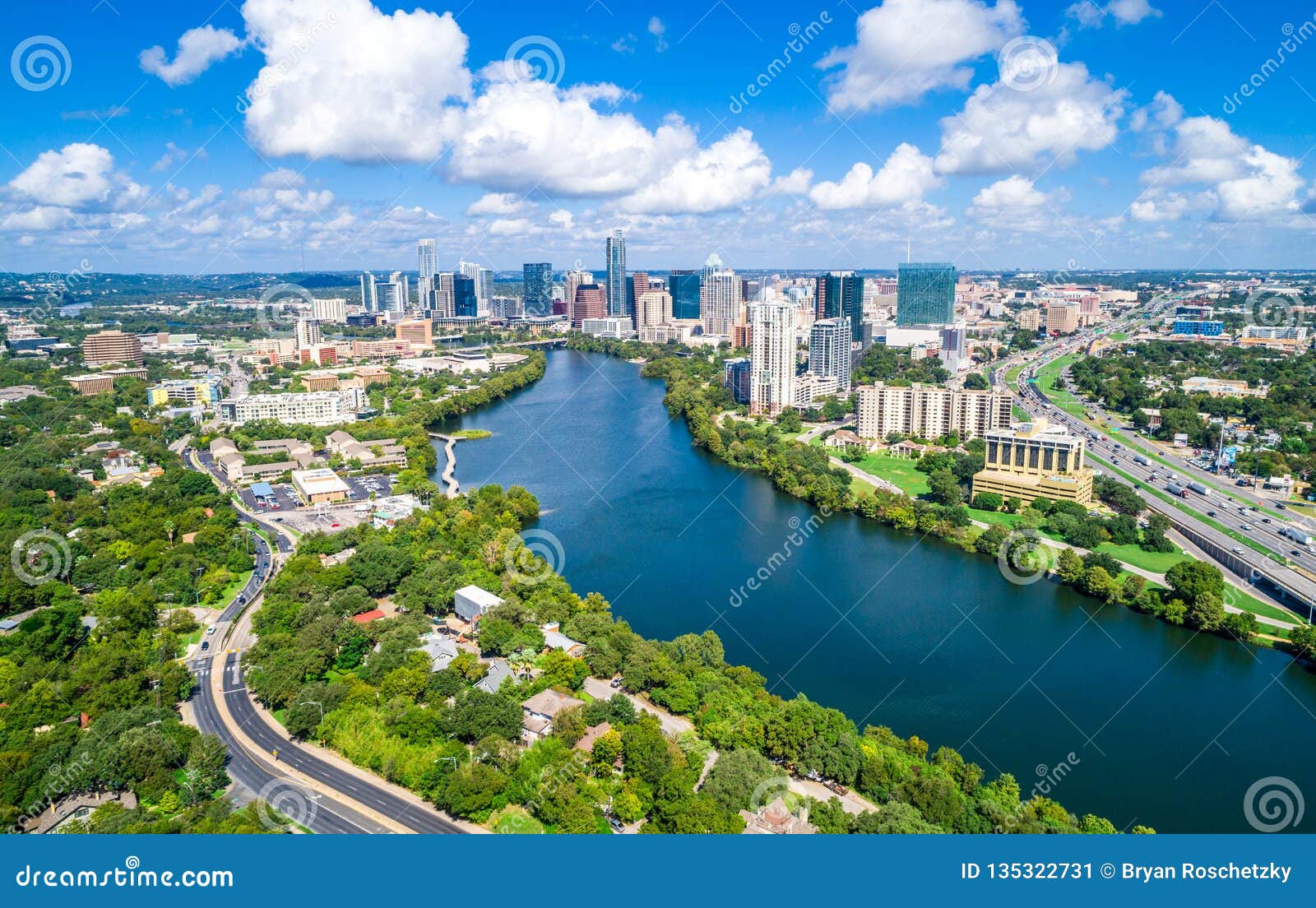 austin texas aerial drone view green landscape summer puffy clouds