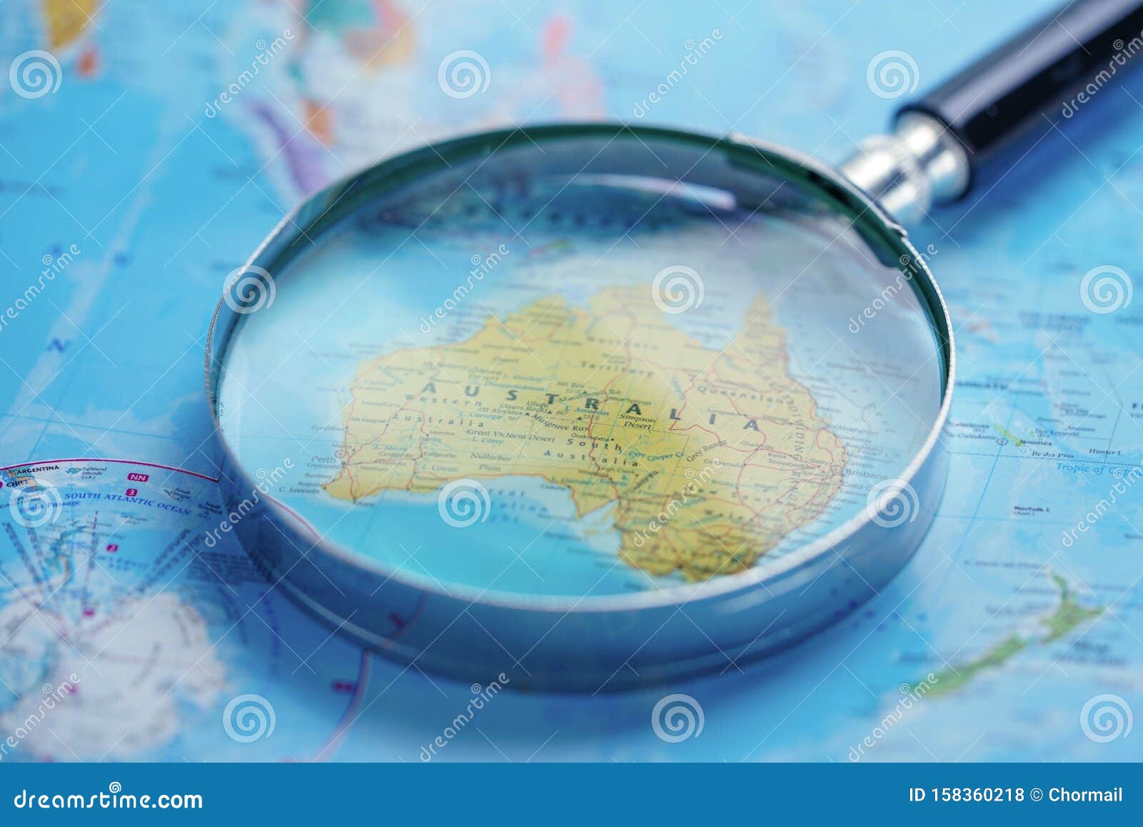 Australia Magnifying Glass with World Glove Map Stock Photo Image