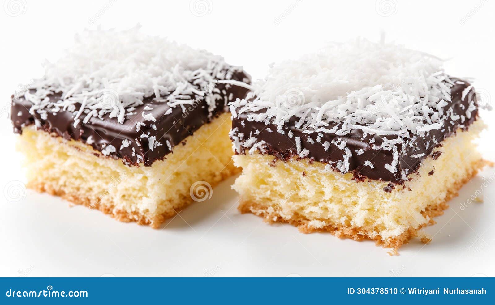 Australian Lamingtons Cake. Sponge Cake with Chocolate Glaze and Grated