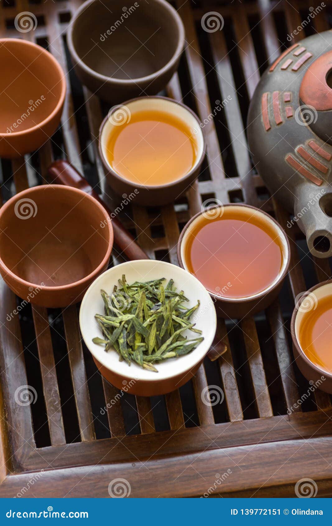 Authentic Chinese Tea Ceremony Setting. Freshly Brewed Beverage Poured