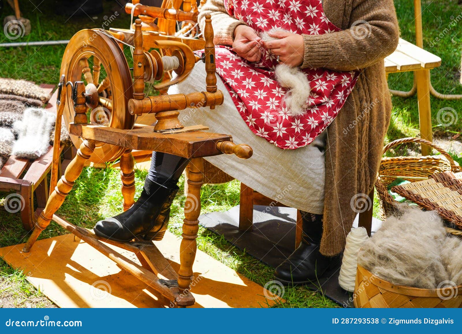 Spinning Wheel For Making Yarn From Wool Fibers. Vintage Rustic Equipment, Stock image