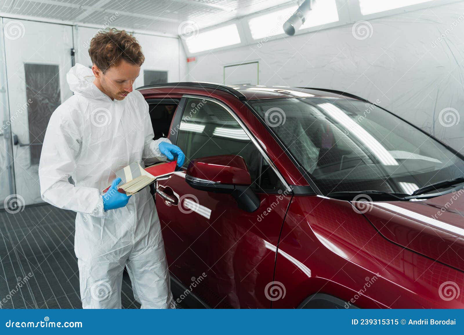 Auto Colorist Selects Car Paint Color with Samples. Stock Image Image