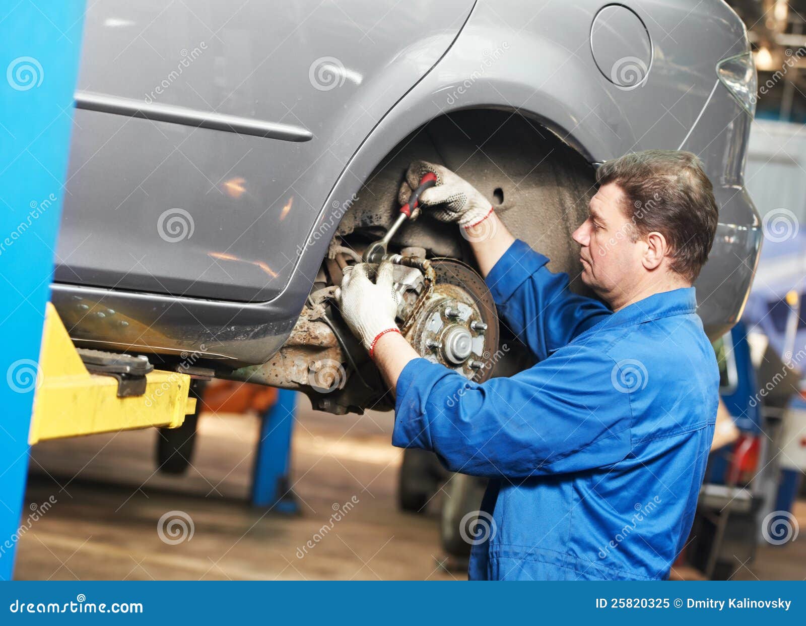 Auto Mechanic at Car Suspension Repair Work Stock Image Image of
