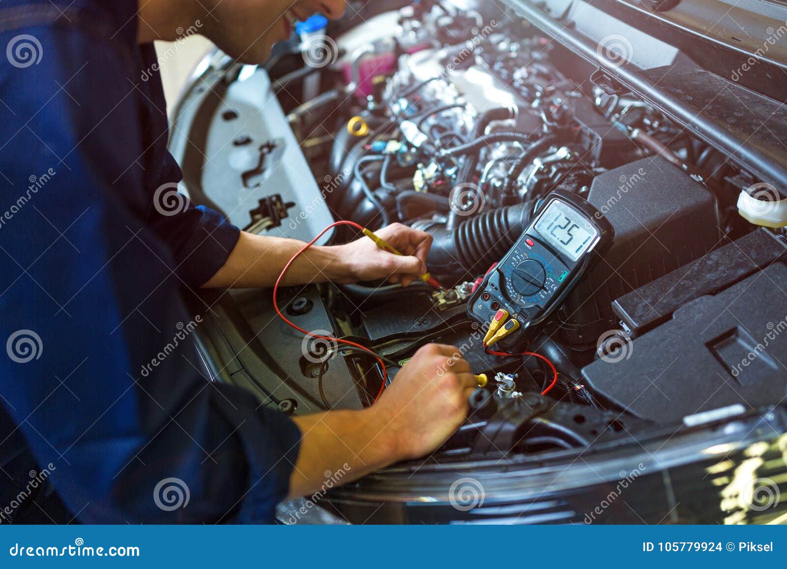 Auto Mechanic Checking Car Battery Voltage Stock Photo Image of electricity, expertise 105779924