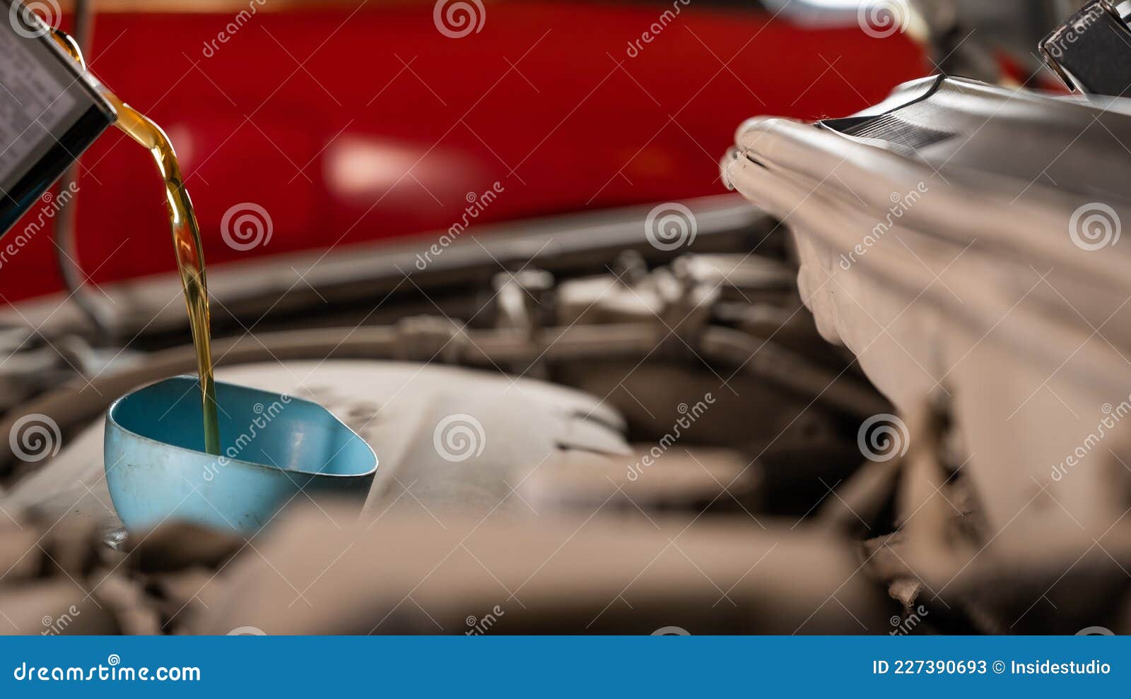 Auto Mechanic Pours Oil into a Car Engine. Stock Image Image of