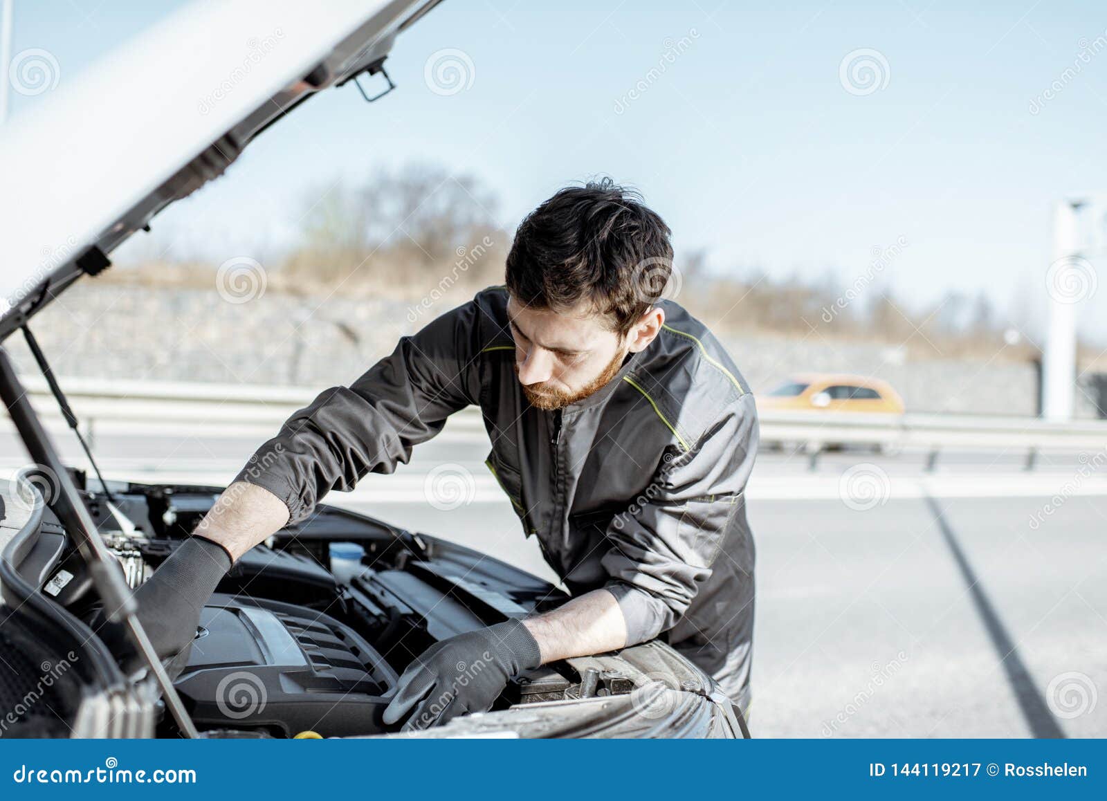 Auto Mechanic Repairing Car Outdoors Stock Image Image of highway