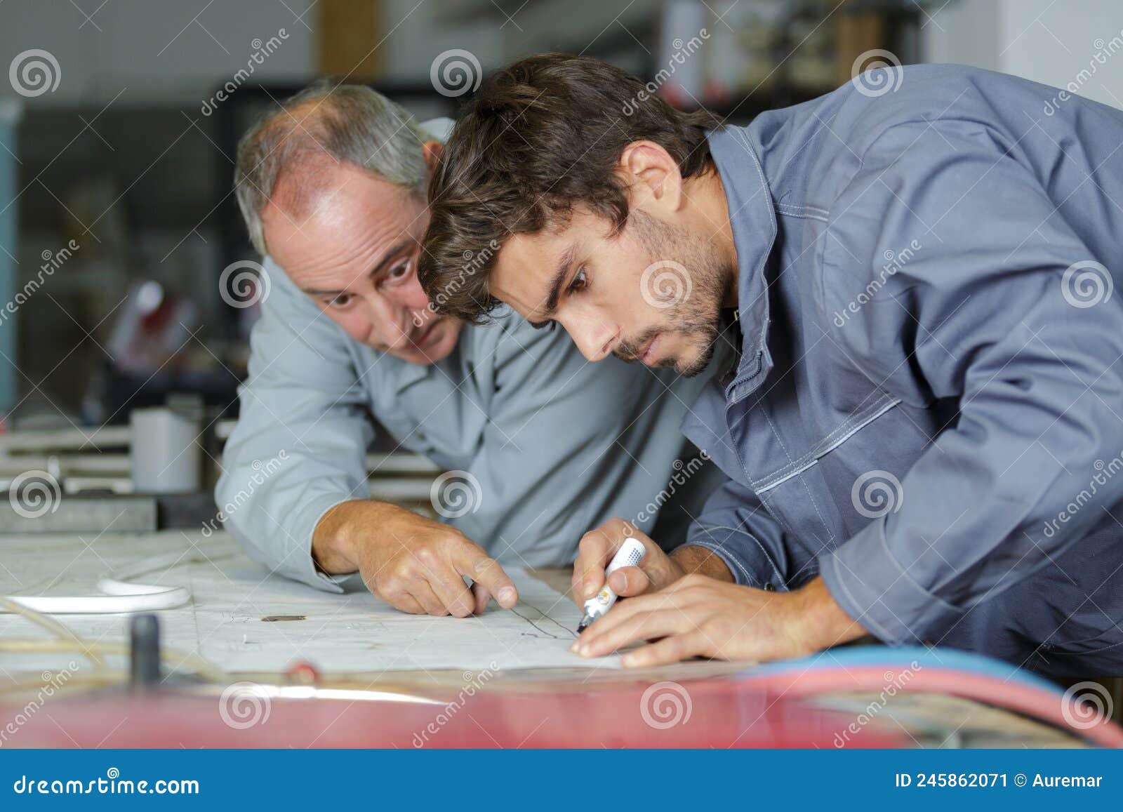 Auto Mechanic Shows Trainee How To Work Stock Image Image of trainers
