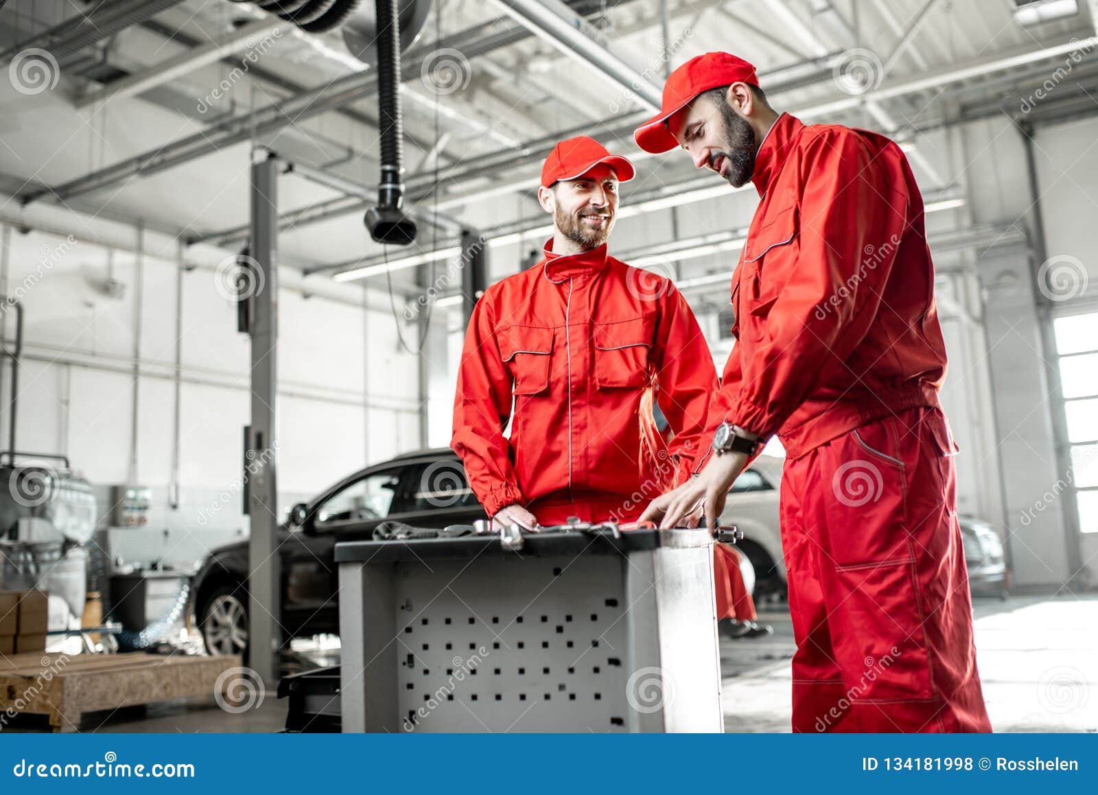 Auto Mechanics with Wrenches at the Car Service Stock Photo Image of