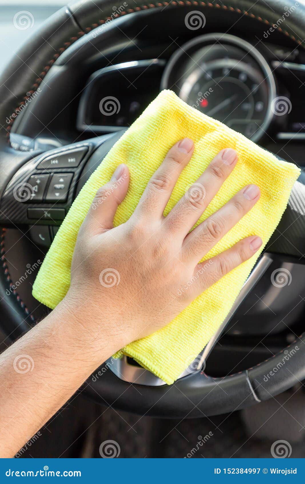 Auto Service Worker Cleaning Inside Car with Micro Fiber Cloth Stock