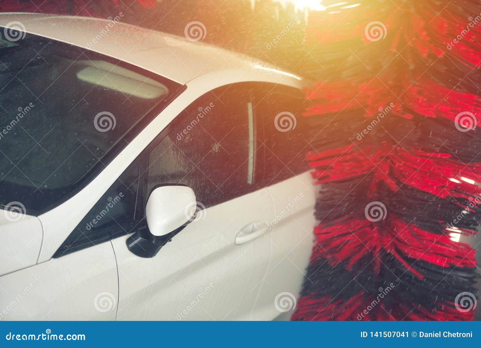 Automatic Car Wash in Action. Car Wash Concept. Automated Technology