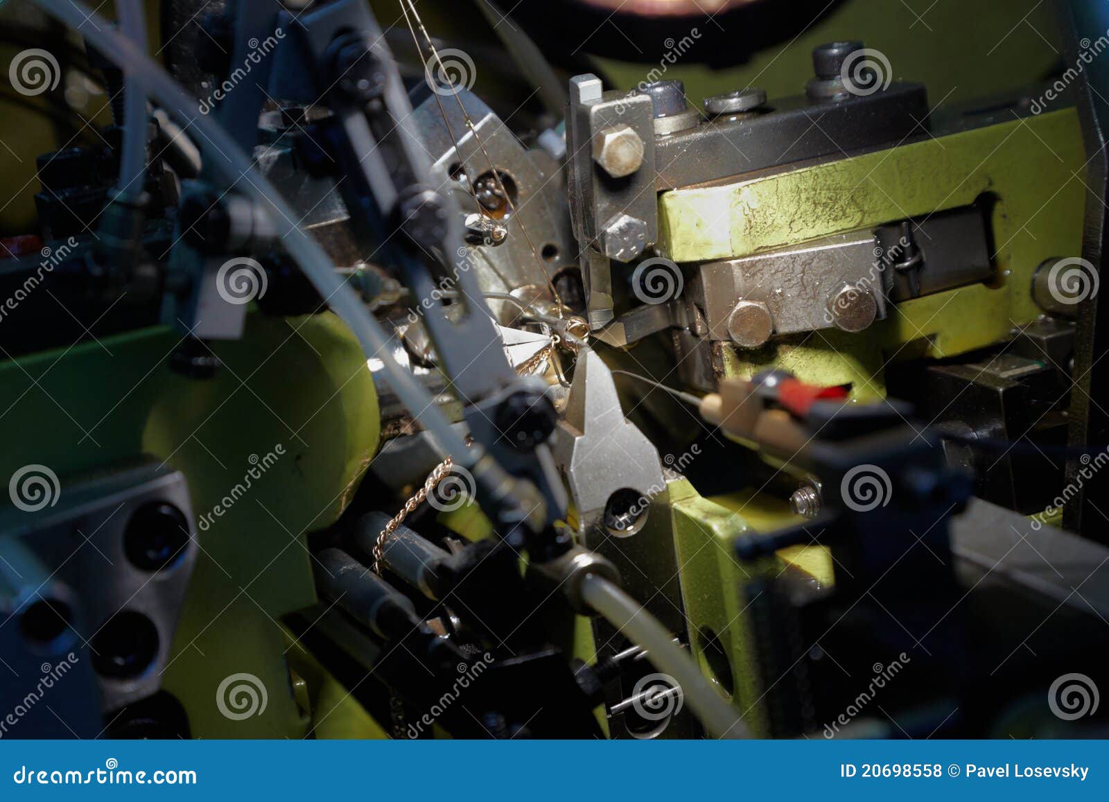 Close-up of Automatic chain-bending machine