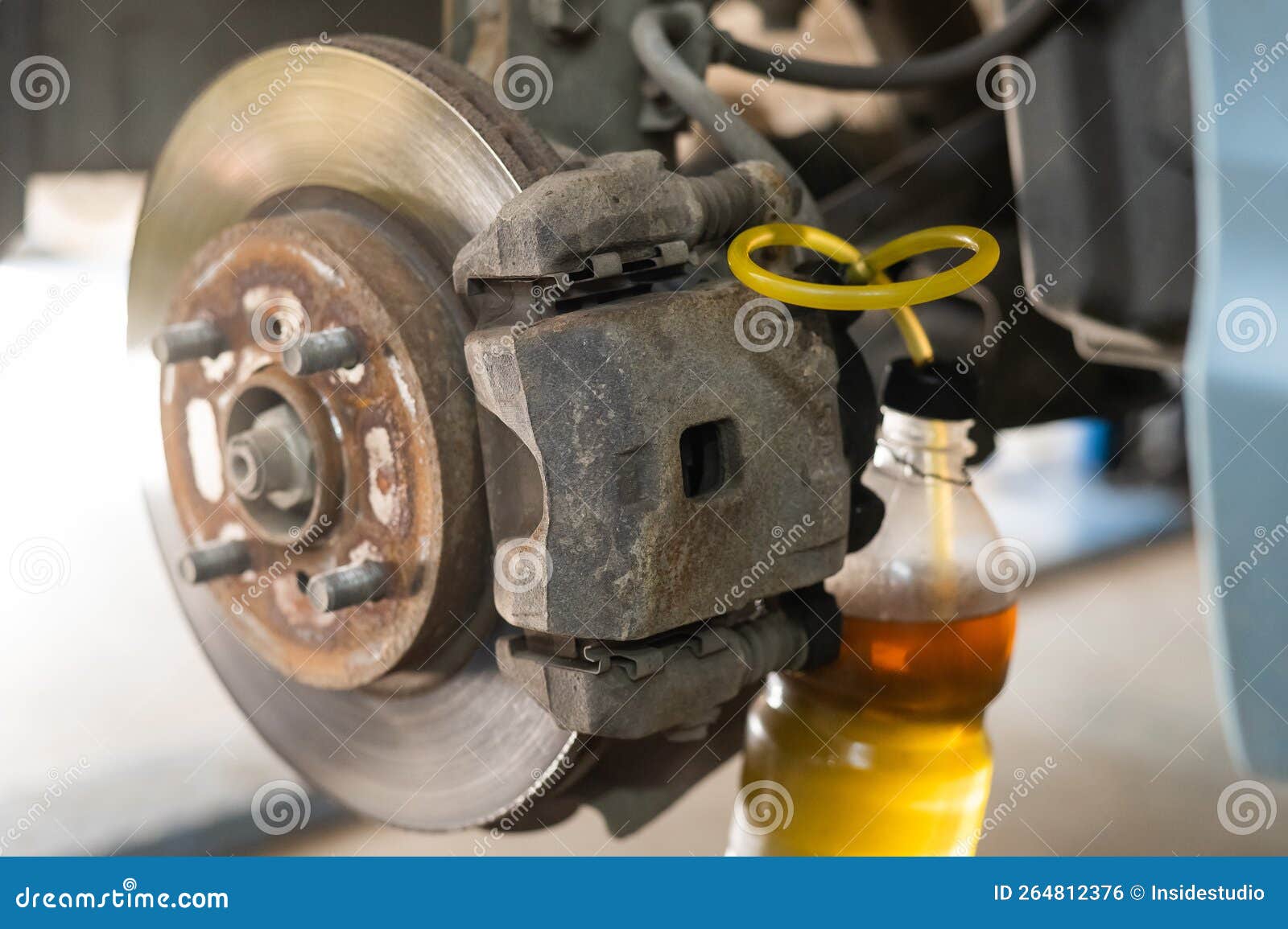 Automatic Change of Brake Fluid in a Car Service. Stock Photo Image