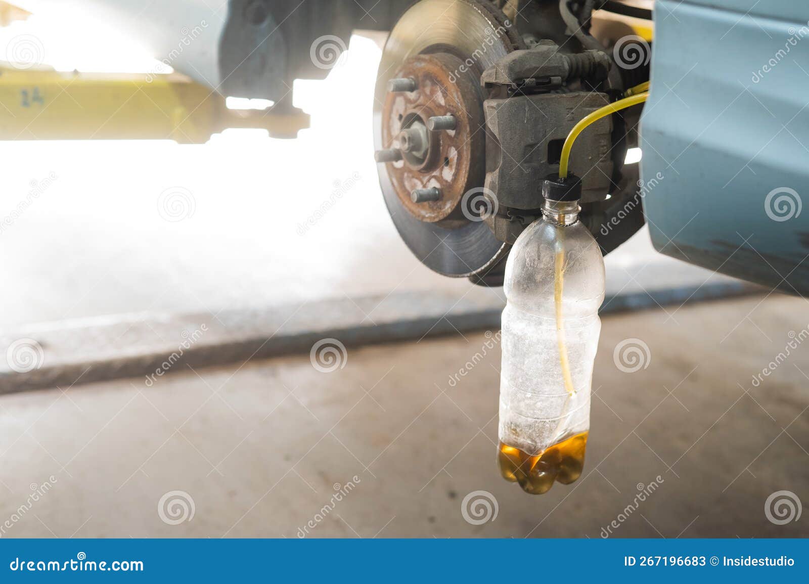 Automatic Change of Brake Fluid in a Car Service. Stock Image Image