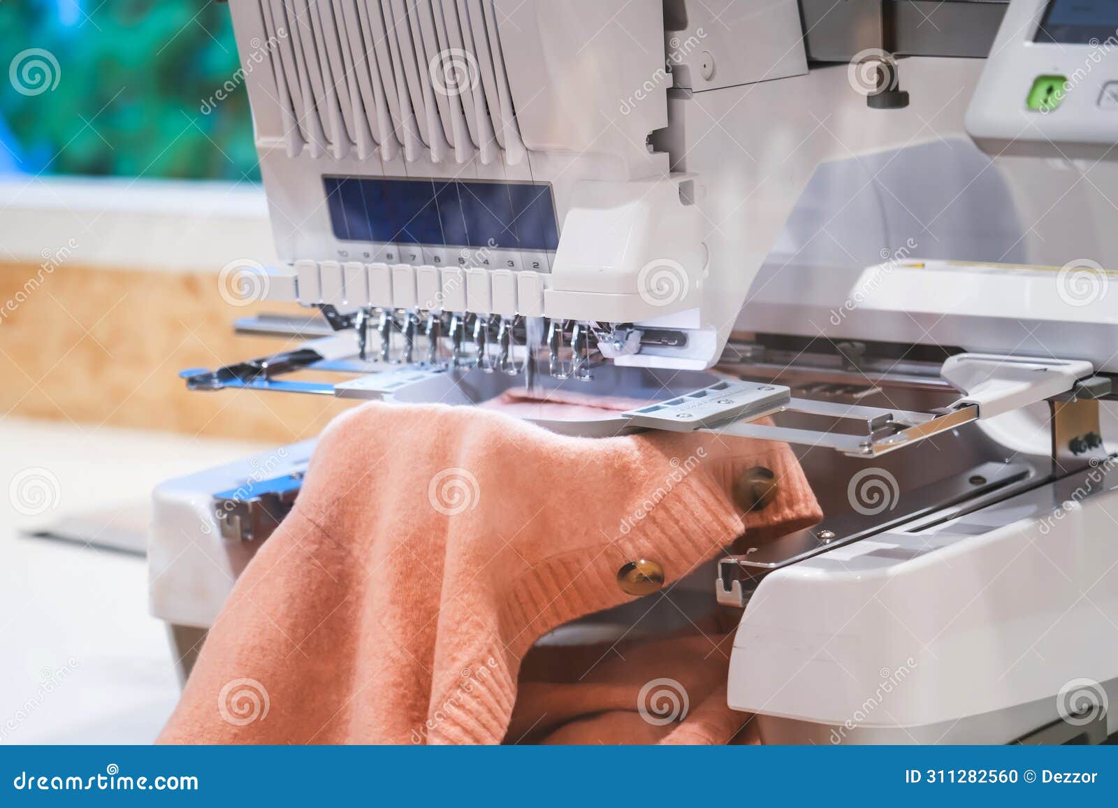 Automatic Sewing Machine for Embroidering Patterns and Designs on