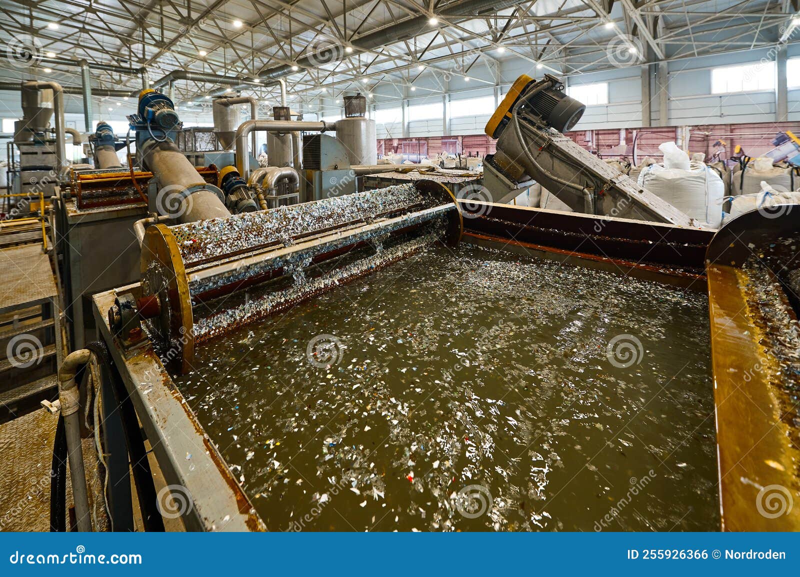 Automatic Shredded Plastic Washing Machine. Washing in a Bath of Water