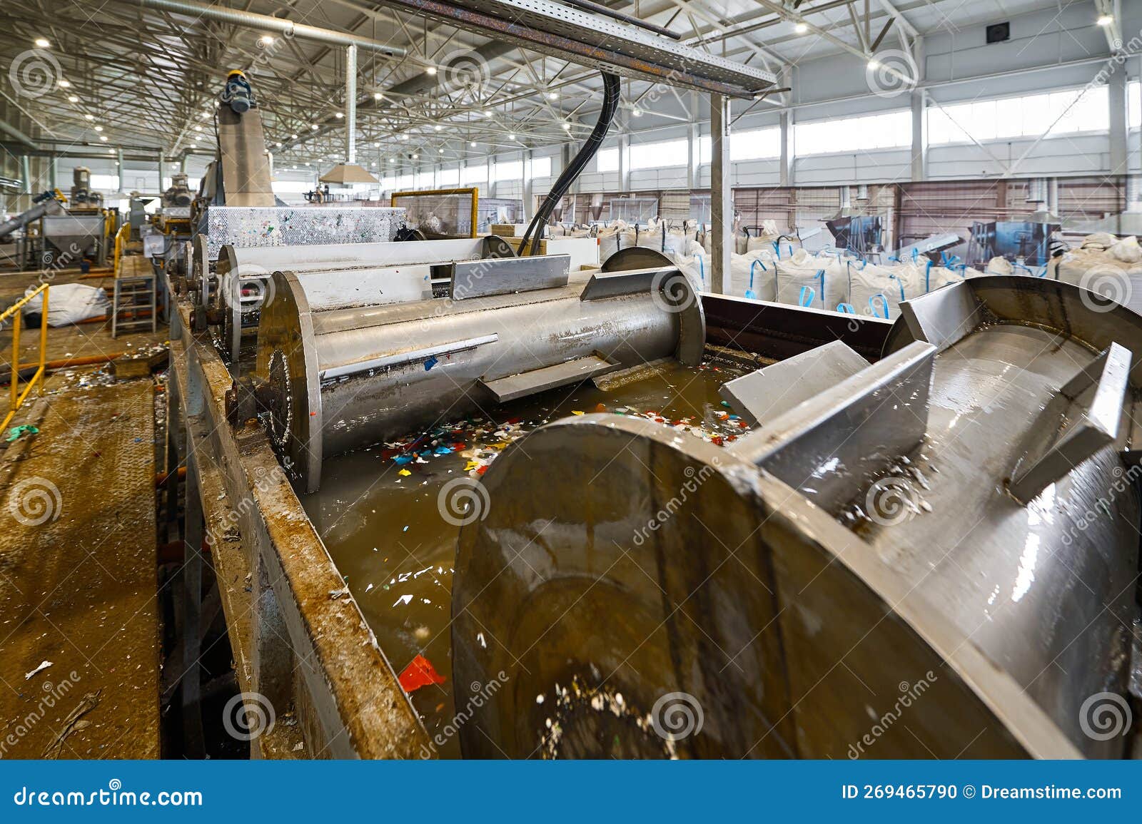 Automatic Shredded Plastic Washing Machine. Washing in a Bath of Water