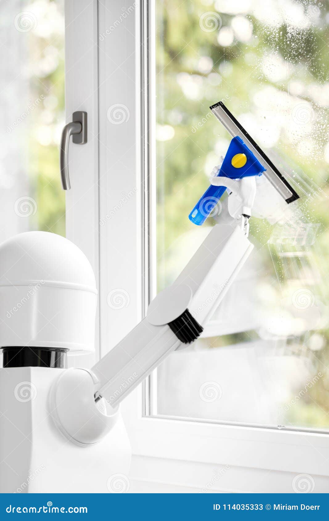 a autonomous robot is washing a window