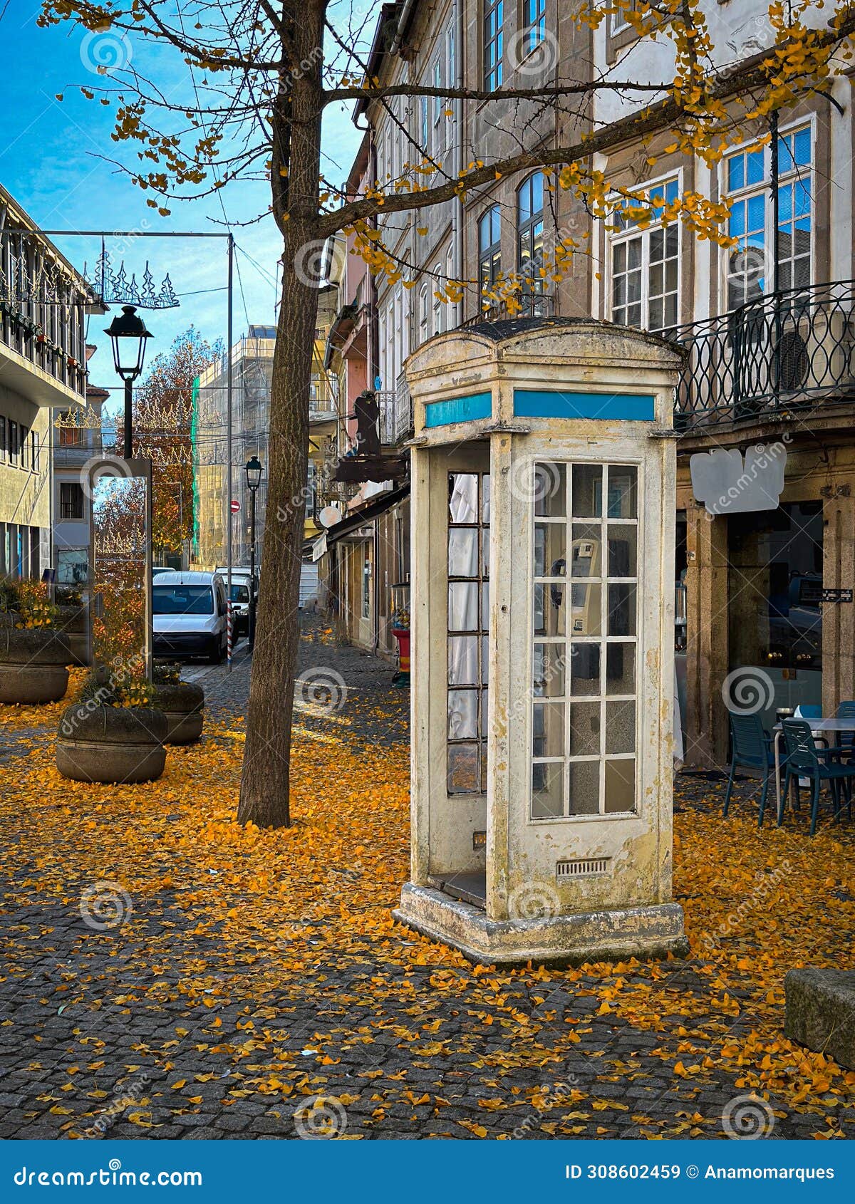 autumn city landscape with typical white telephone booth in chaves, vila real, tras os montes, portugal