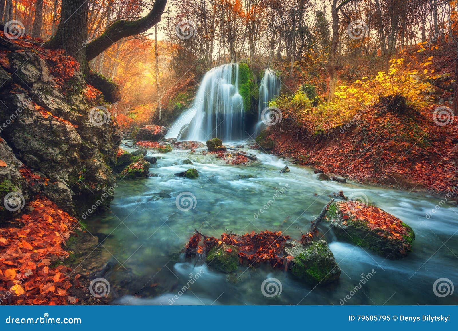 Autumn Forest With Waterfall At Mountain River At Sunset Stock Image