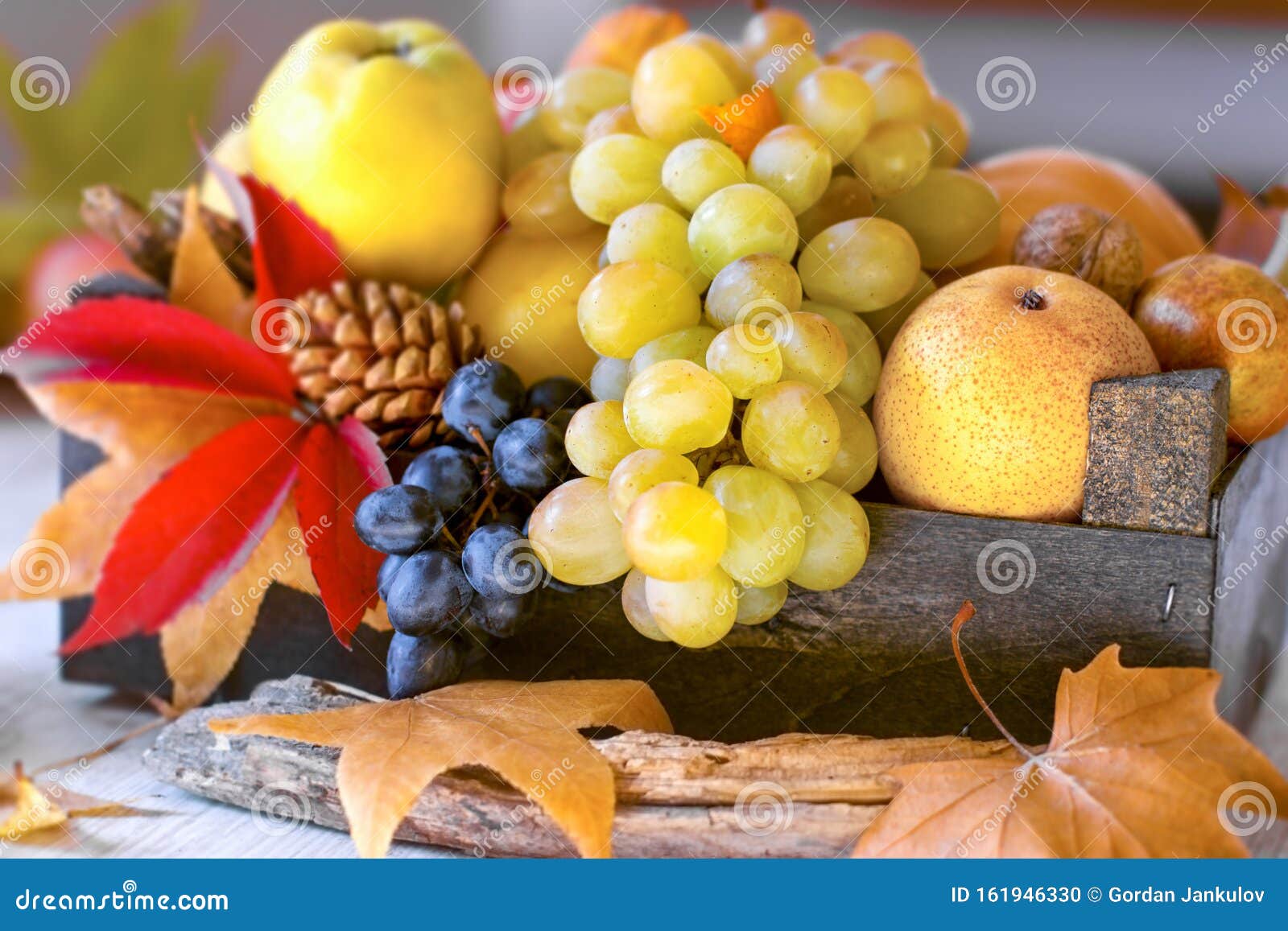autumn frut and vegetable in wooden crate