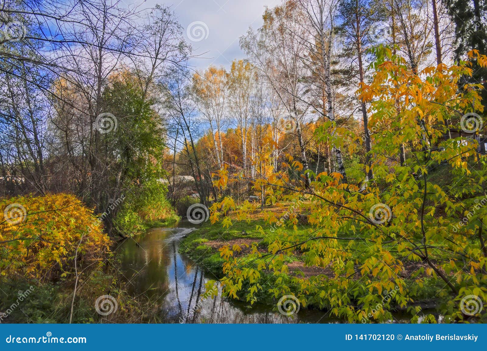 Autumn Landscape with Small Rural River at the Edge of the Village