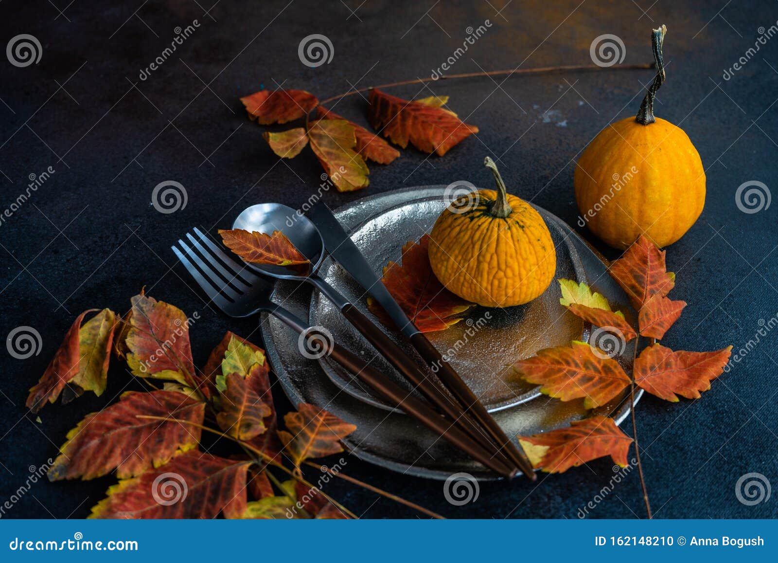 Autumnal table setting stock photo. Image of halloween - 162148210