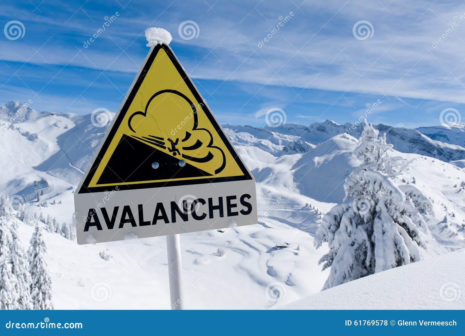 avalanche sign in winter alps with snow