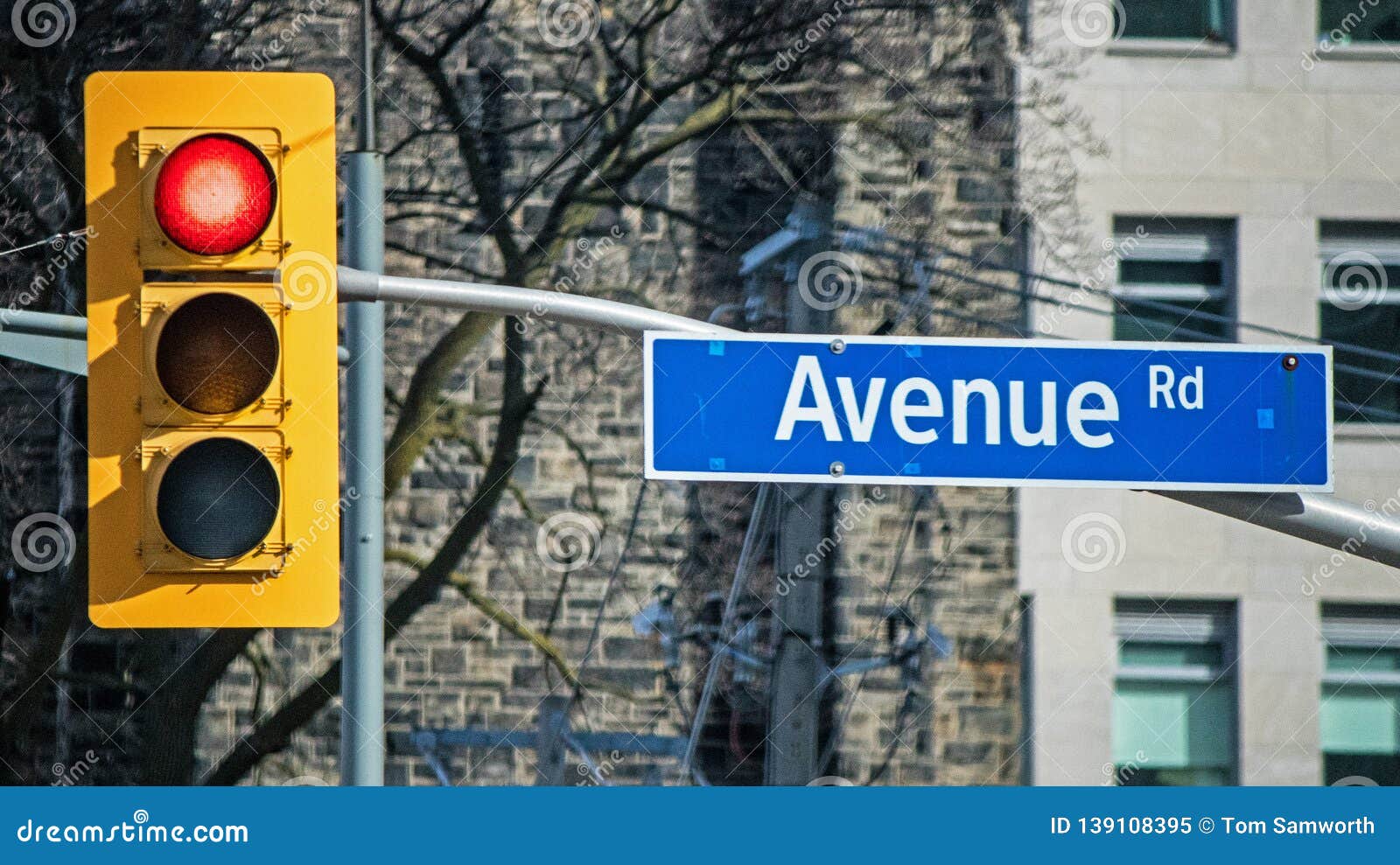 avenue-road-street-sign-red-light-traffic-along-st-clair-ave-west-toronto-ontario-canada-139108395.jpg
