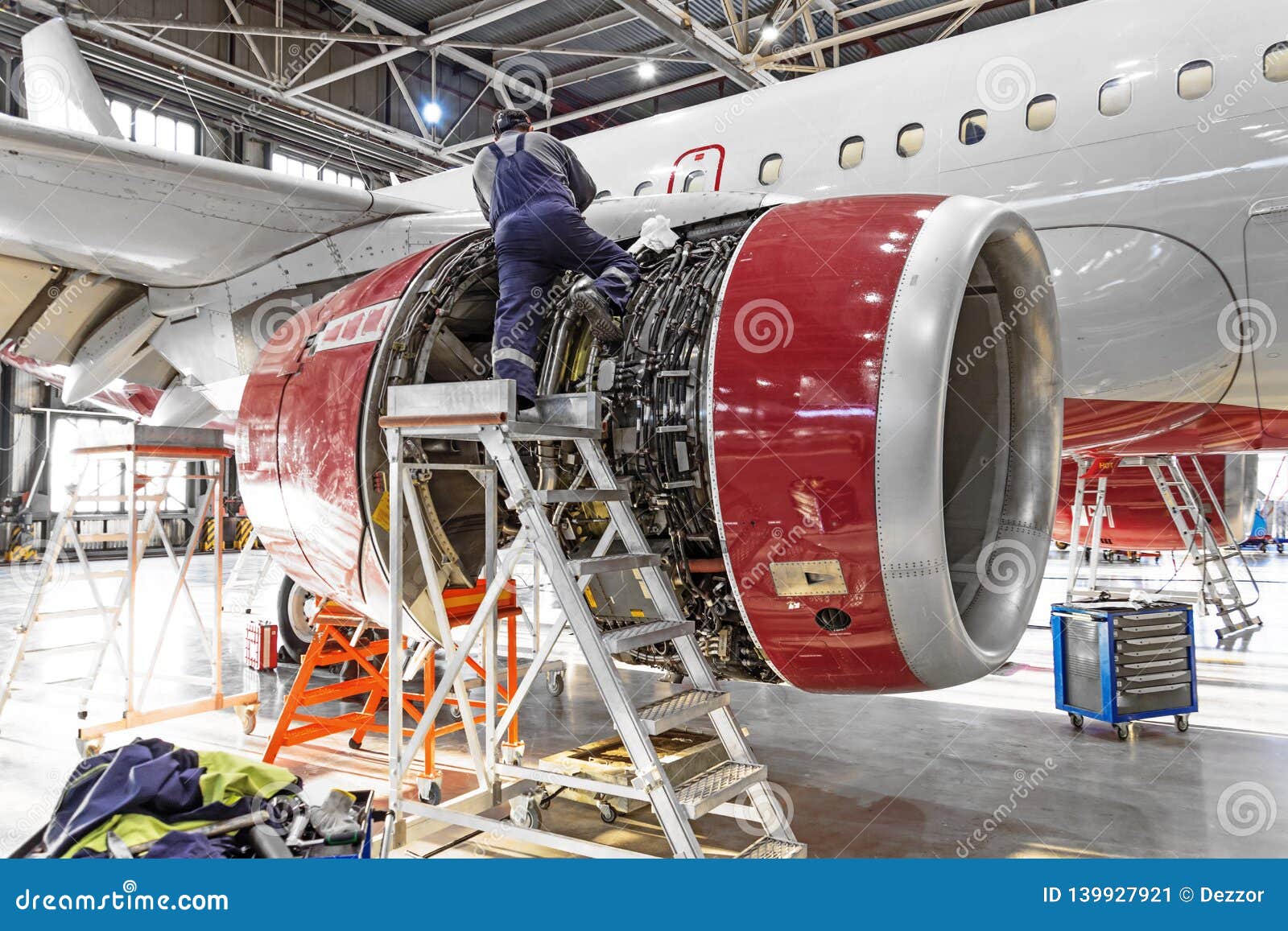 aviation industry, mechanic repairs aircraft engine jet