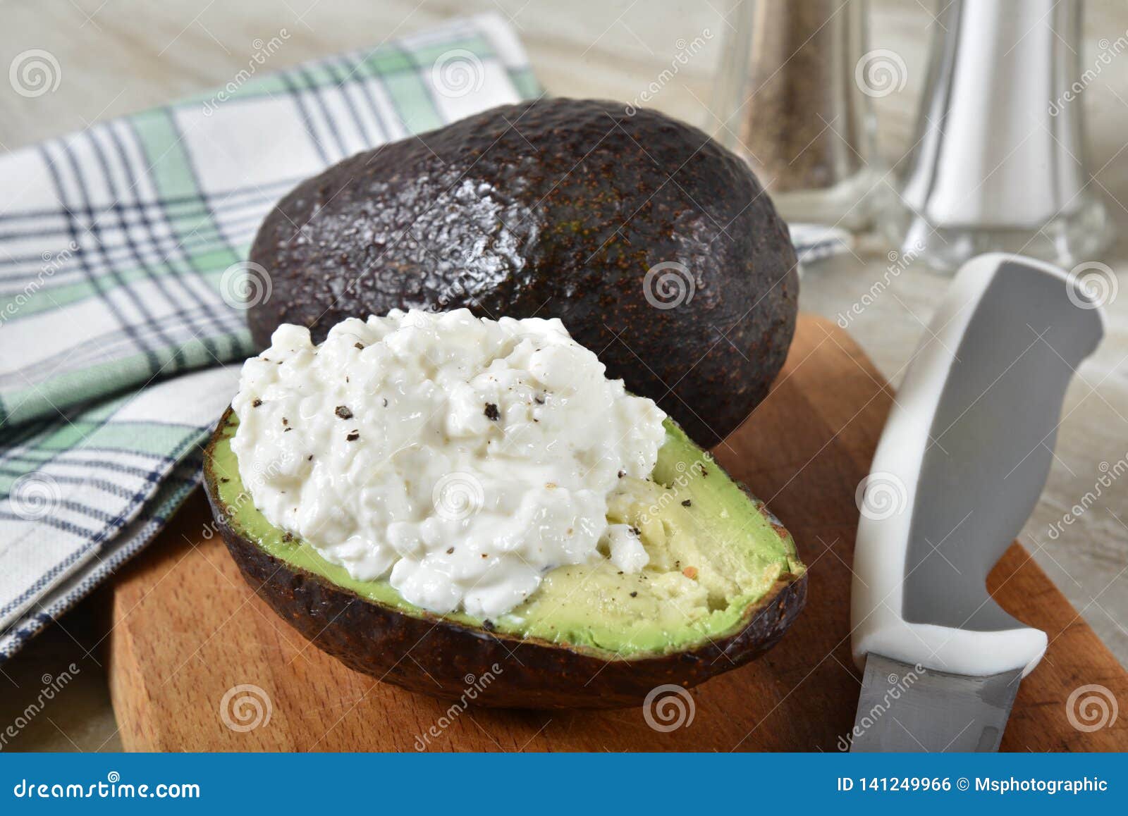 Avocado And Cottage Cheese Stock Photo Image Of Scoop 141249966