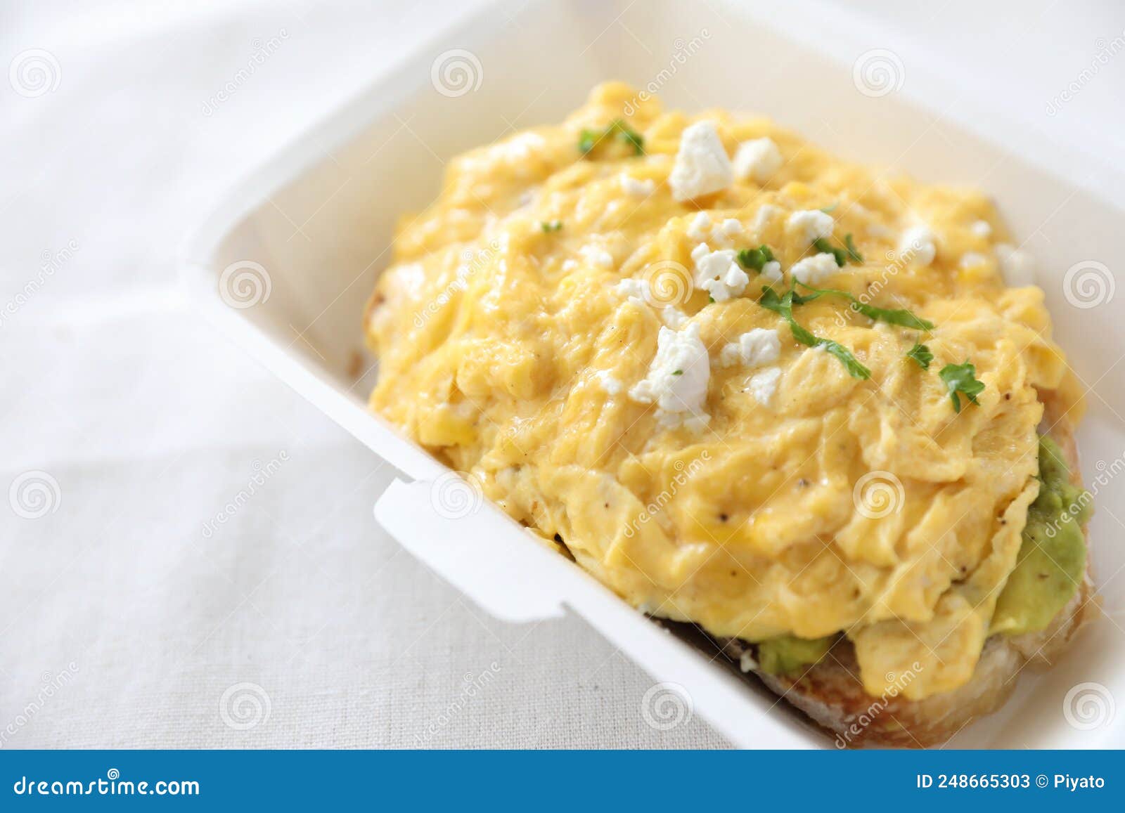 Avocado and Scrambled Eggs Toast with Delivery Package in White