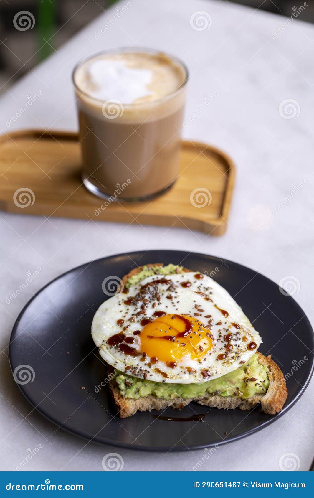 Avocado Toast with SunnySide Up Egg Stock Image Image of latte