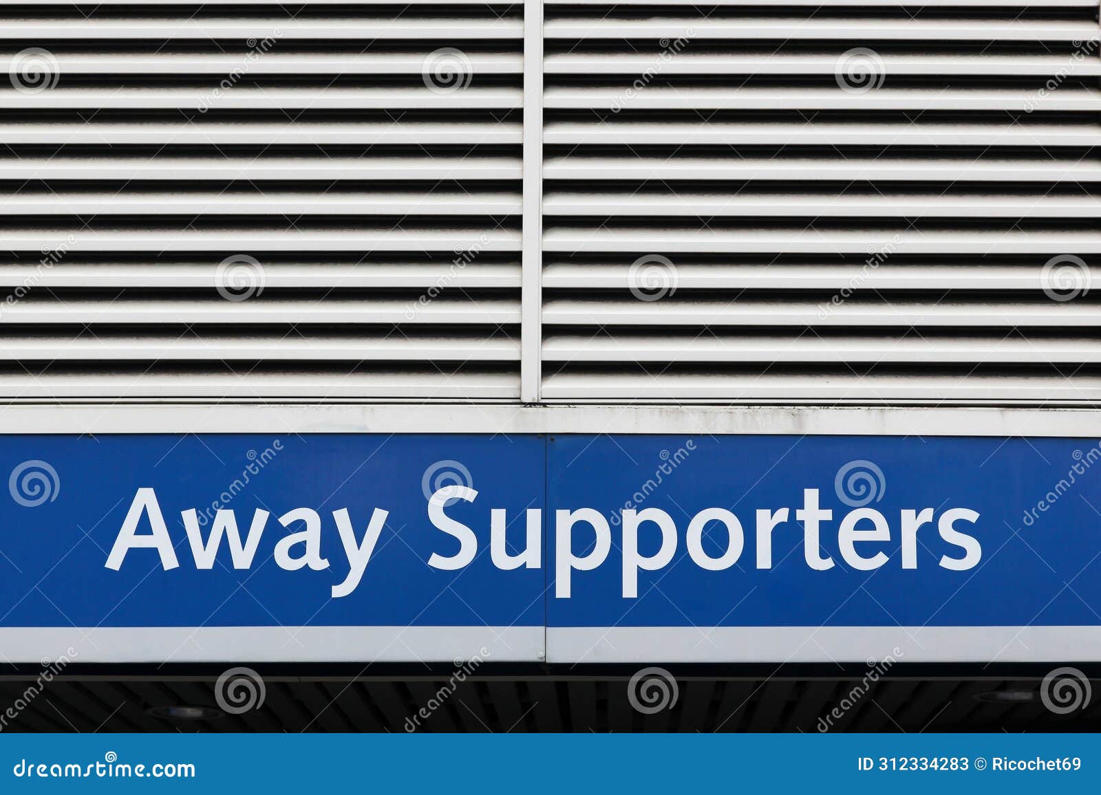 away supporters entrance sign on a wall