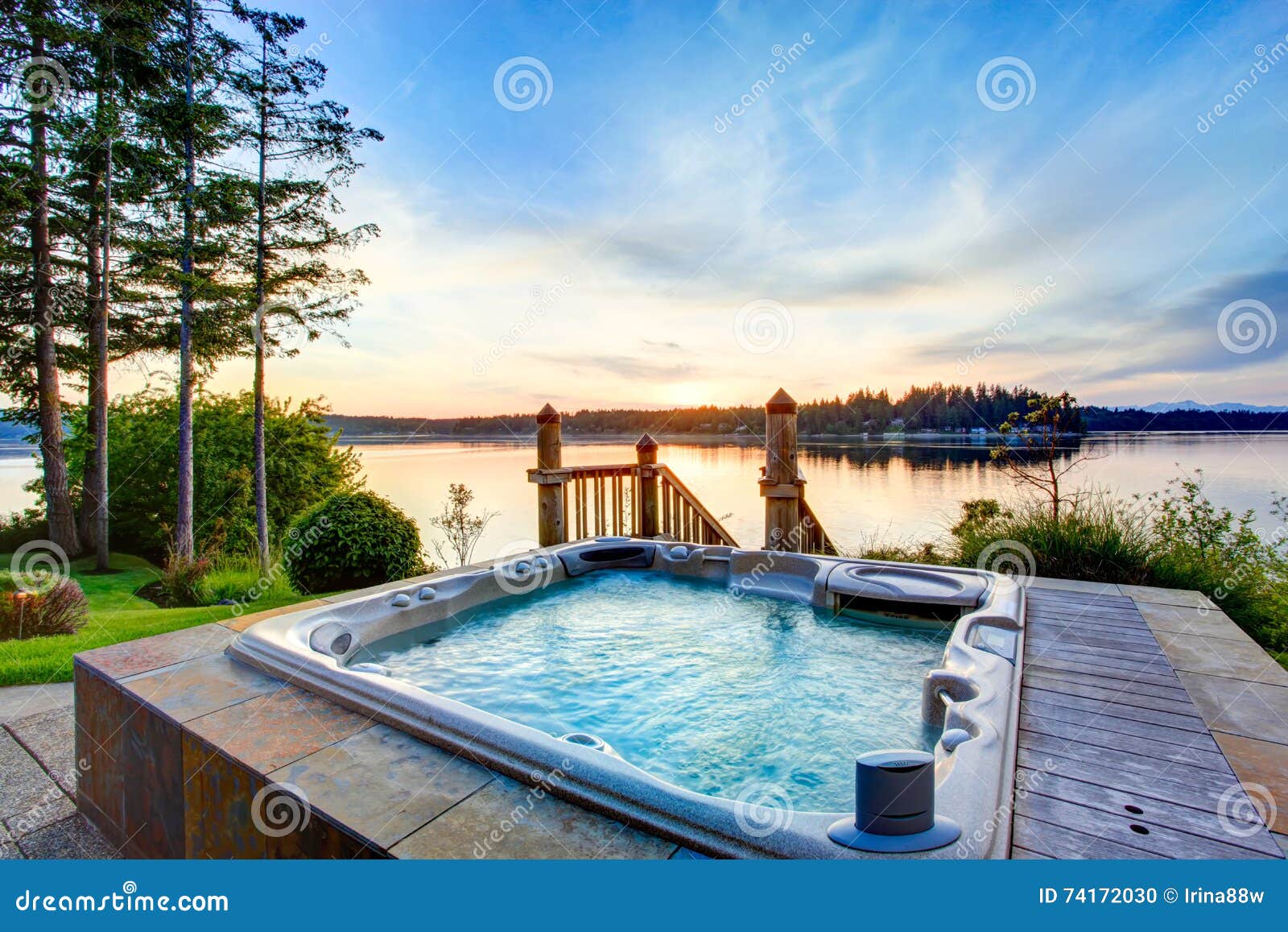 awesome water view with hot tub in summer evening.
