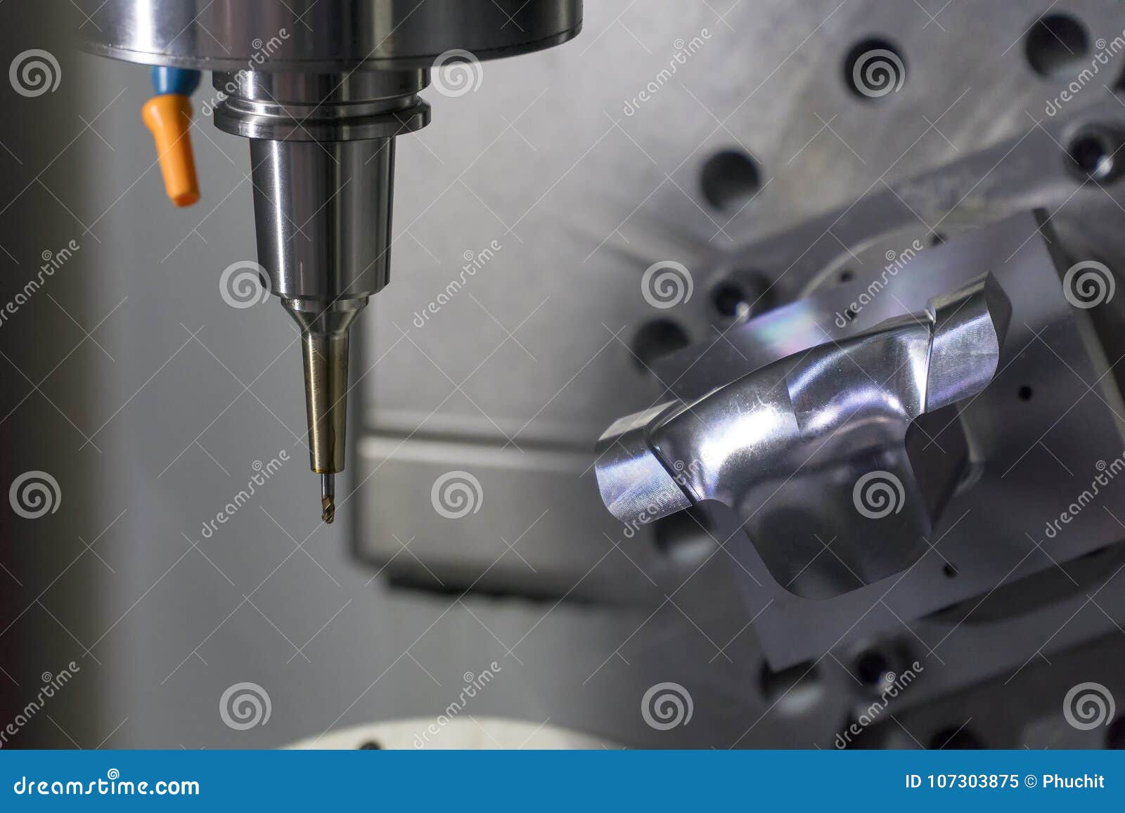 The 5 Axis Cnc Machine Cutting The Sample Part The 5 Axis Cnc Machine Cutting The Sample Part