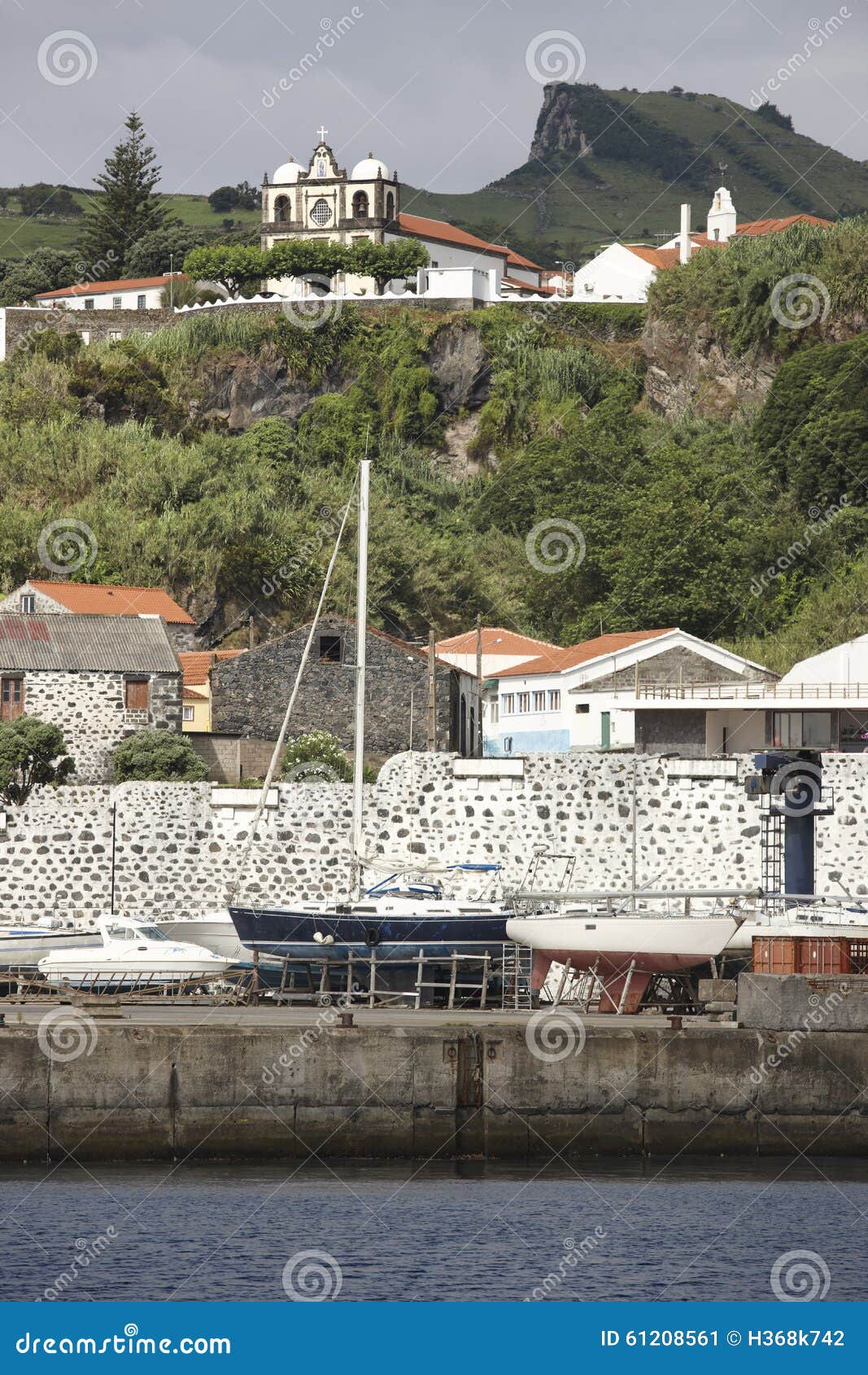 azores landscape in lajes das flores with sailboats and church