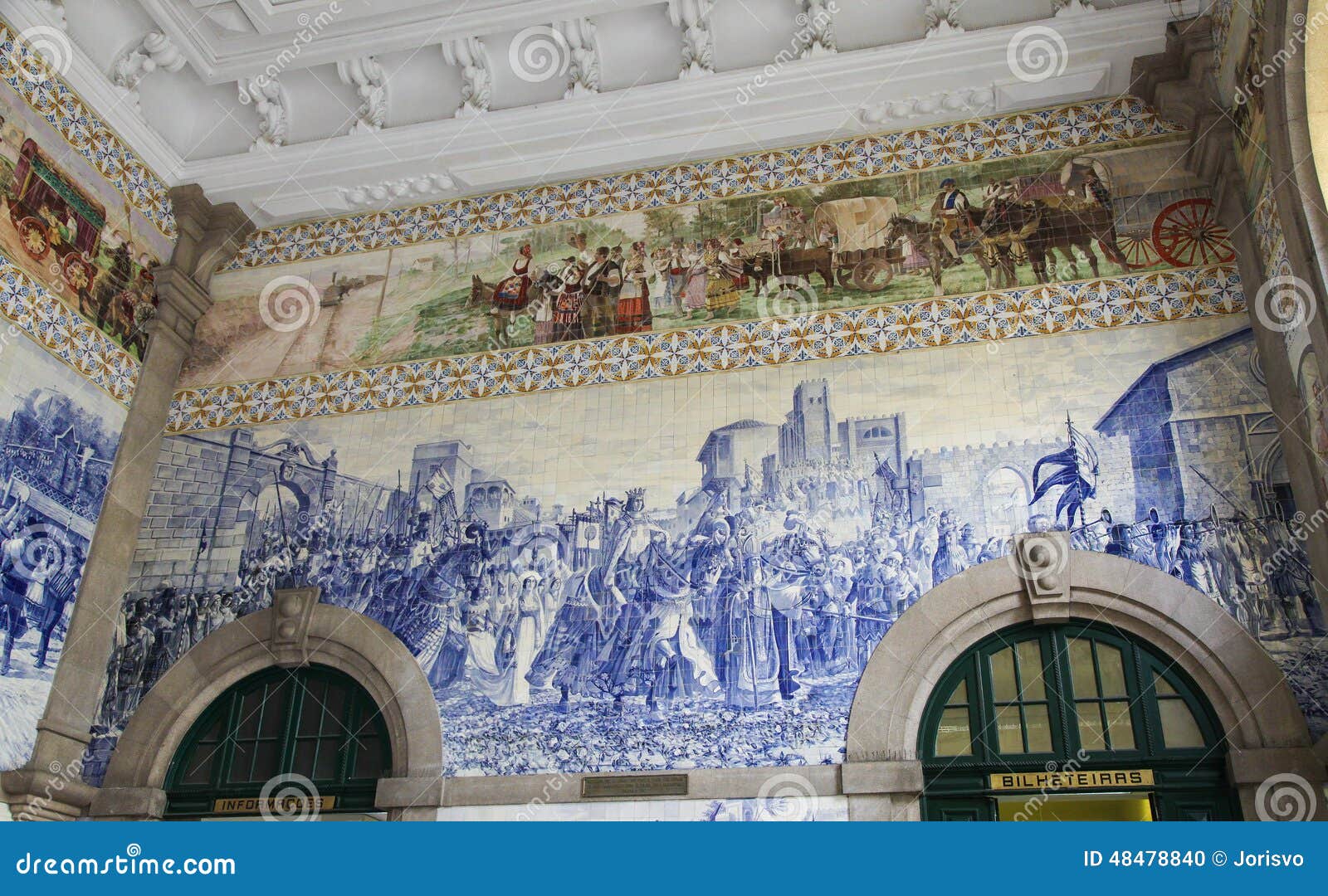 azulejo panel in sao bento railway station in porto, portugal