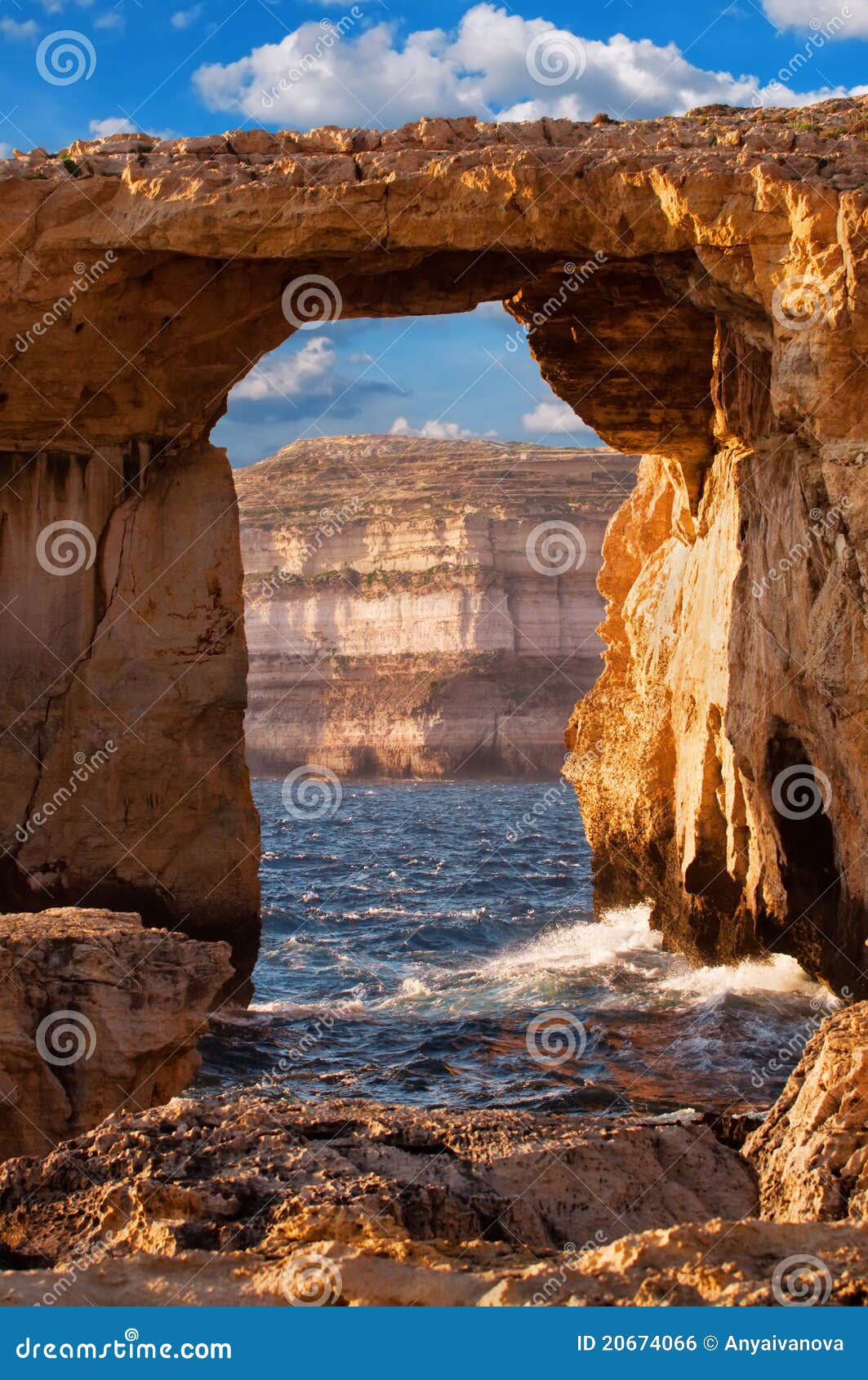 Azure window, Gozo island, Malta. Azure window, natural stone arch by Dwejra cliffs at western Gozo island, Malta