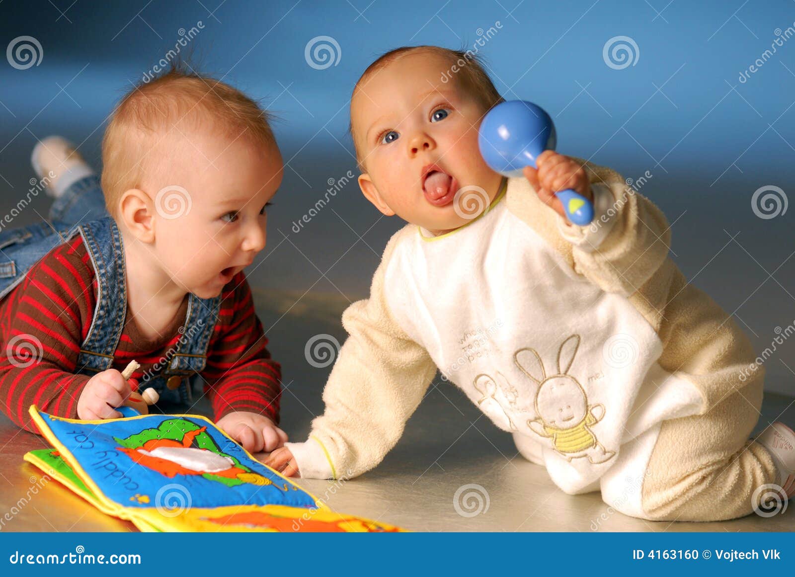 Babies with toys stock photo. Image of plaything, playthings 4163160