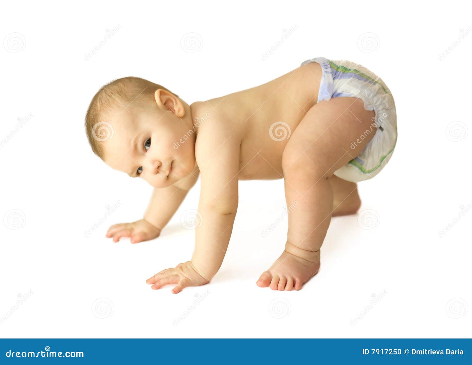 Baby Is Creeping On All Fours, Looking And Smiling Stock Photography