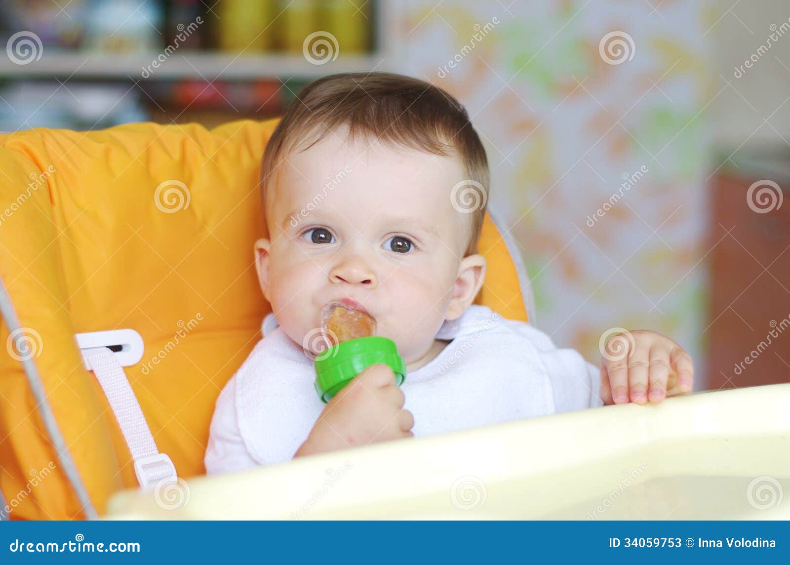 Baby Age of 11 Months Eats Fruits by Using Nibbler Stock Image Image